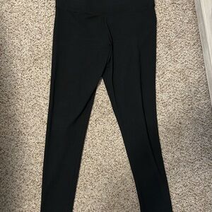Woman’s black leggings, brand: Pink VS